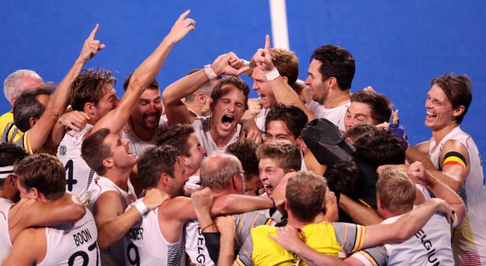 Belgium celebrate victory in the men’s gold medal match in the hockey.