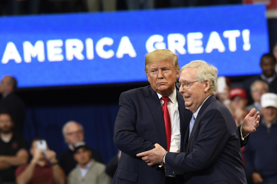 President Donald Trump embraces Senate Majority Leader Mitch McConnell of Ky., on stage during a campaign rally in Lexington, Ky., Monday, Nov. 4, 2019. (AP Photo/Susan Walsh)