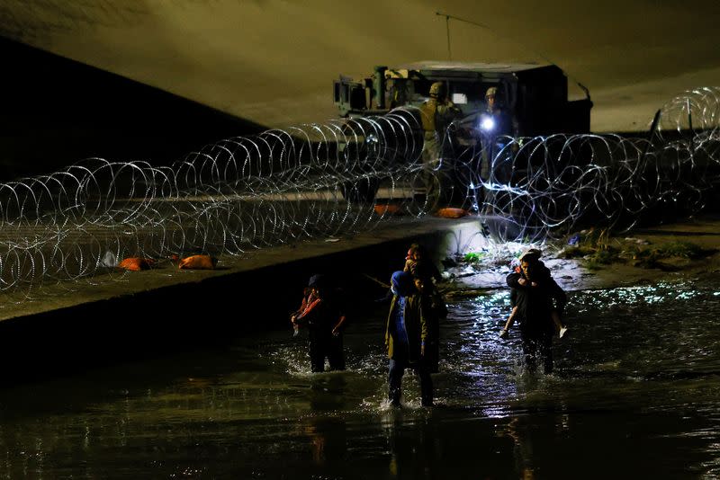 Asylum-seeking migrants at the border between Mexico and the United States, in Ciudad Juarez