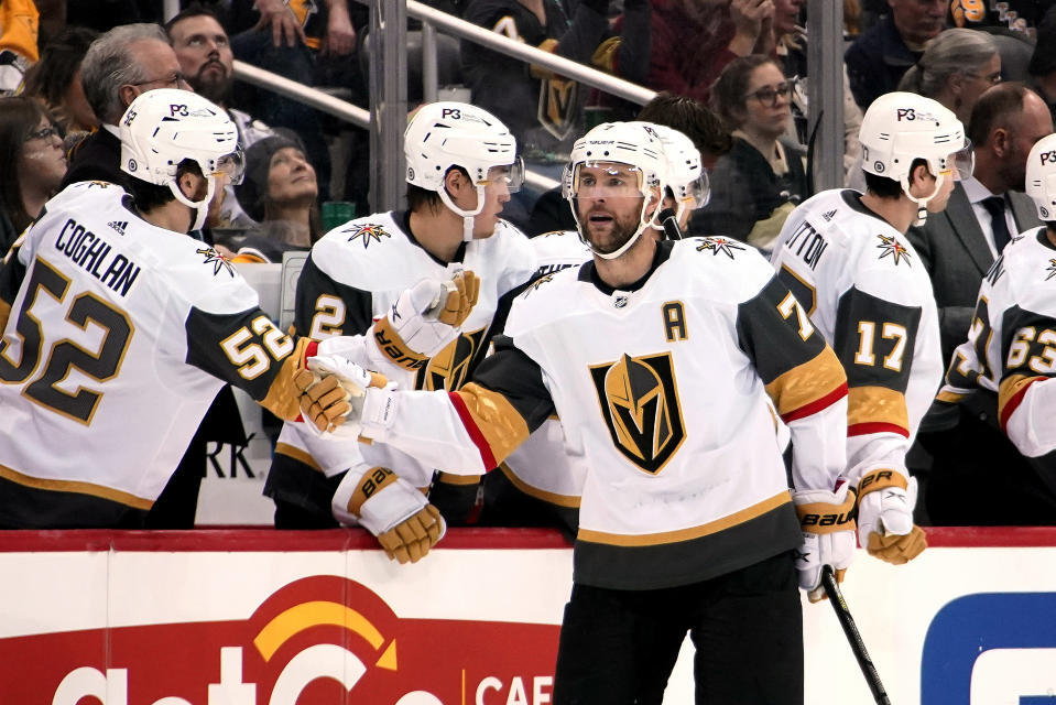 Vegas Golden Knights' Alex Pietrangelo (7) returns to the bench after scoring during the second period of the team's NHL hockey game against the Pittsburgh Penguins in Pittsburgh, Friday, March 11, 2022. (AP Photo/Gene J. Puskar)