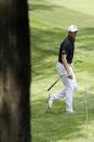 Jordan Spieth hits from the rough on the ninth hole during opening round of the Workday Charity Open golf tournament, Thursday, July 9, 2020, in Dublin, Ohio. (AP Photo/Darron Cummings)