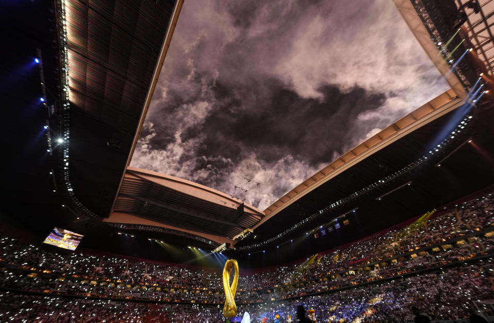 Smoke from fireworks is seen over the stadium at the opening ceremony prior he World Cup, group A soccer match between Qatar and Ecuador at the Al Bayt Stadium in Al Khor, Sunday, Nov. 20, 2022. (AP Photo/Natacha Pisarenko)