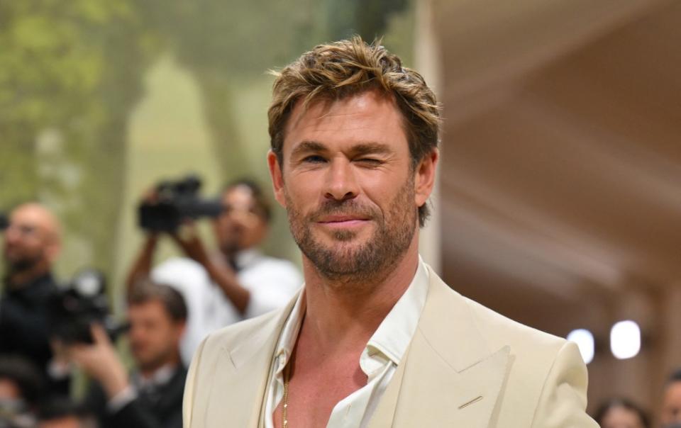 Chris Hemsworth is quick to defend Marvel movies from hate. AFP via Getty Images