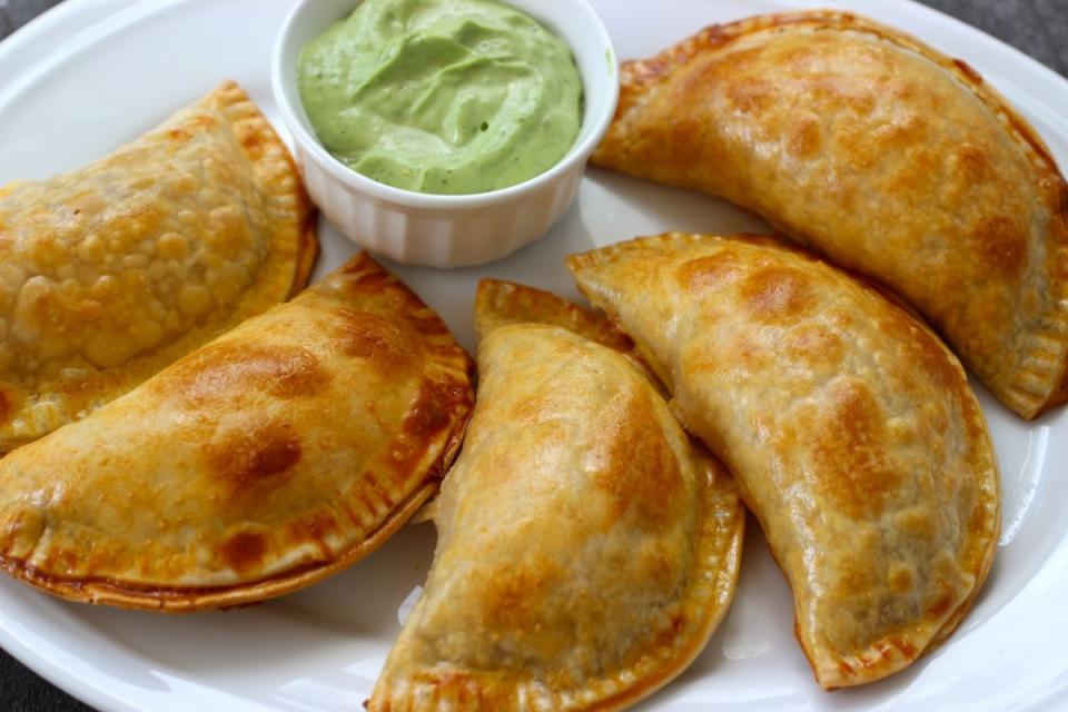 <p>Erica Dinho</p><p> These empanadas are filled with shredded chicken, onions, garlic, mushrooms and cheese.</p><p><strong>Get the recipe:</strong> <a href="https://parade.com/221339/ericadinho/chicken-cheese-and-mushroom-empanadas/" rel="nofollow noopener" target="_blank" data-ylk="slk:Chicken, Cheese and Mushroom Empanadas;elm:context_link;itc:0;sec:content-canvas" class="link ">Chicken, Cheese and Mushroom Empanadas</a></p>