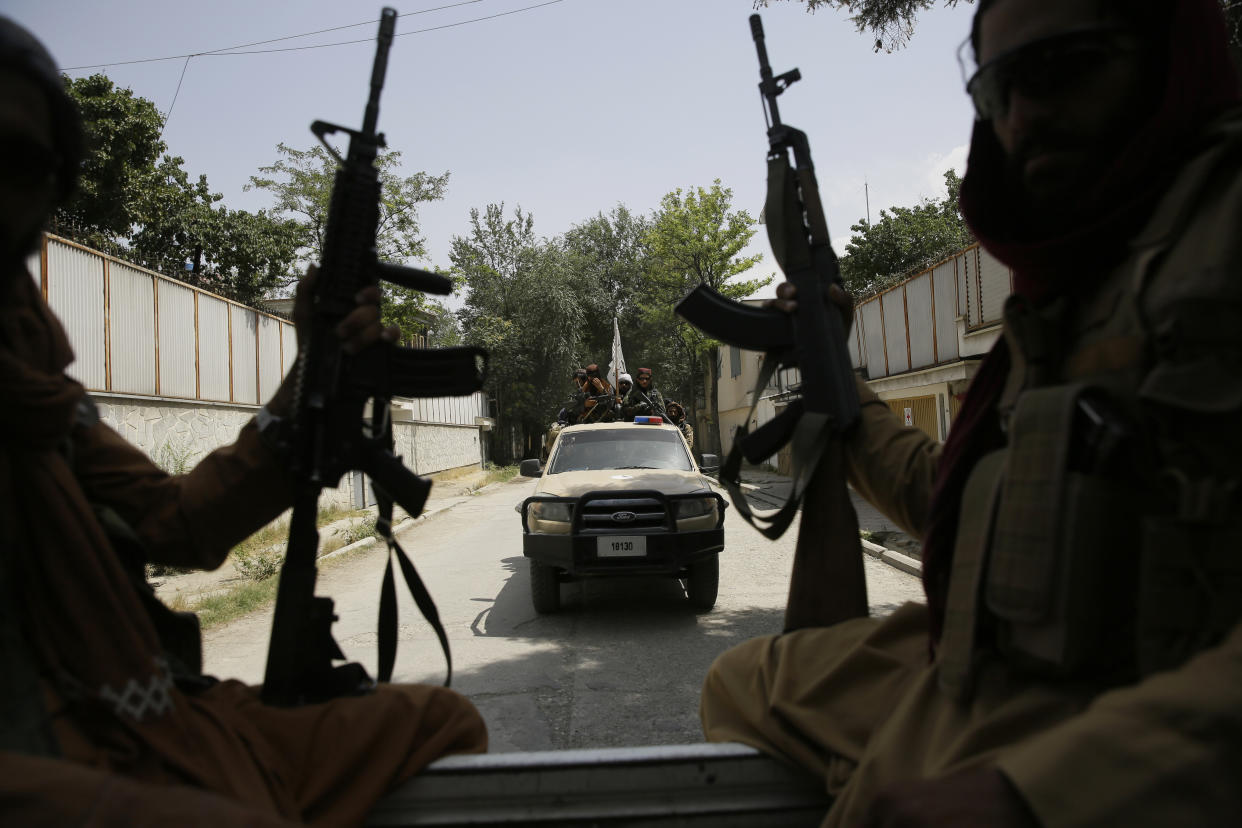 Taliban fighters patrol in Kabul on Thursday. 