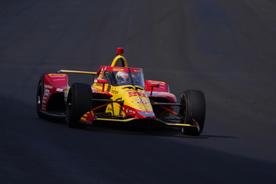 Romain Grosjean, of France, drives into Turn 1 during testing at Indianapolis Motor Speedway, Thursday, April 21, 2022, in Indianapolis. (AP Photo/Darron Cummings)