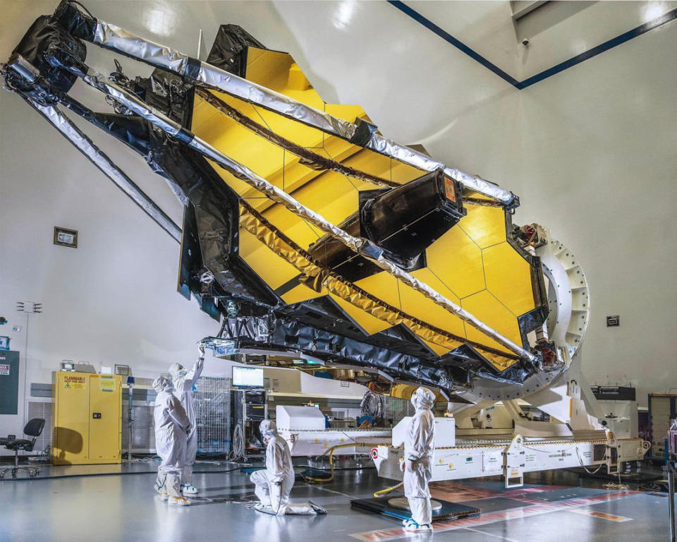 Winner, 'Documentation' category: The Webb telescope's optical element is prepared for integration onto the spacecraft element