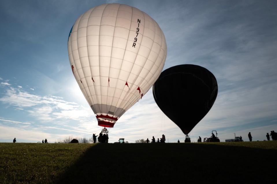 Hot air balloonists offering rides to people during the solar eclipse celebration in Perryville, Missouri. Getty Images