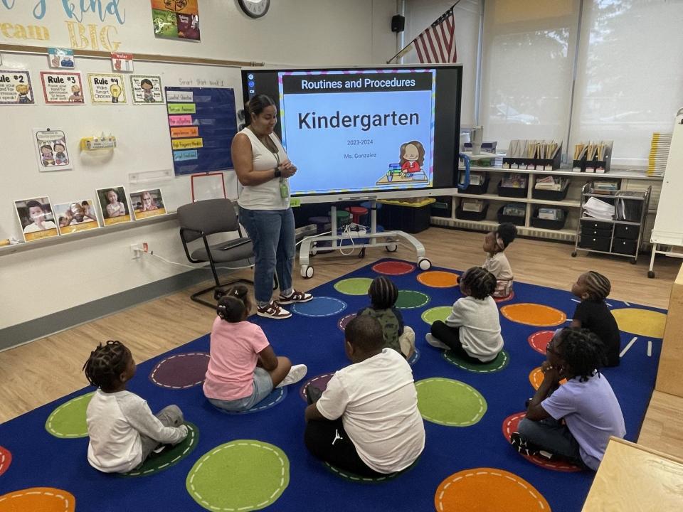 Meagan Gonzalez marks the first day of school for her kindergarteners in her EastSide Charter School classroom on Aug. 30, 2023, in Wilmington, Delaware.