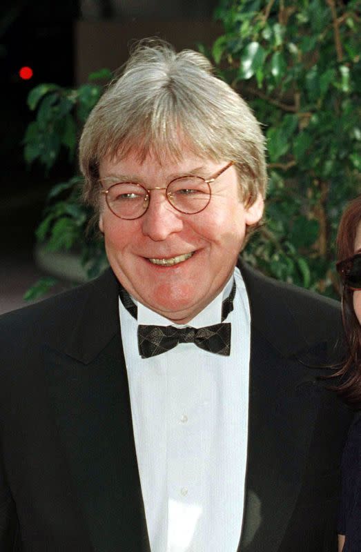 FILE PHOTO: Director Alan Parker arrives for the 54th Annual Golden Globes in Beverly Hills