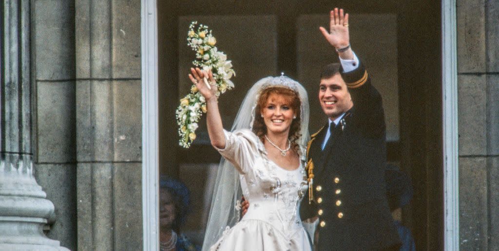 view of just married couple sarah, duchess of york, and prince andrew, duke of york, as they wave from the balcony of buckingham palace, london, england, july 23, 1986 photo by derek hudsongetty images