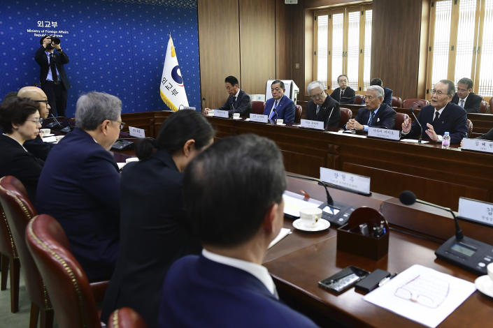 Mikio Sasaki, chairman of the Japan-Korea Economic Association, right, speaks during a meeting with South Korean Foreign Minister Park Jin, third from left, at the Foreign Ministry in Seoul, South Korea, Monday, May 15, 2023. (Kim Min-Hee/Pool Photo via AP)