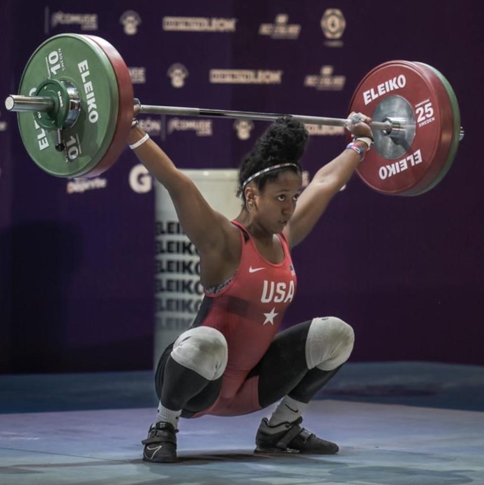 DeLand's Mia Rhodes successfully completed all six of her attempts in the snatch and clean and jerk at the IWF Youth World Championships.