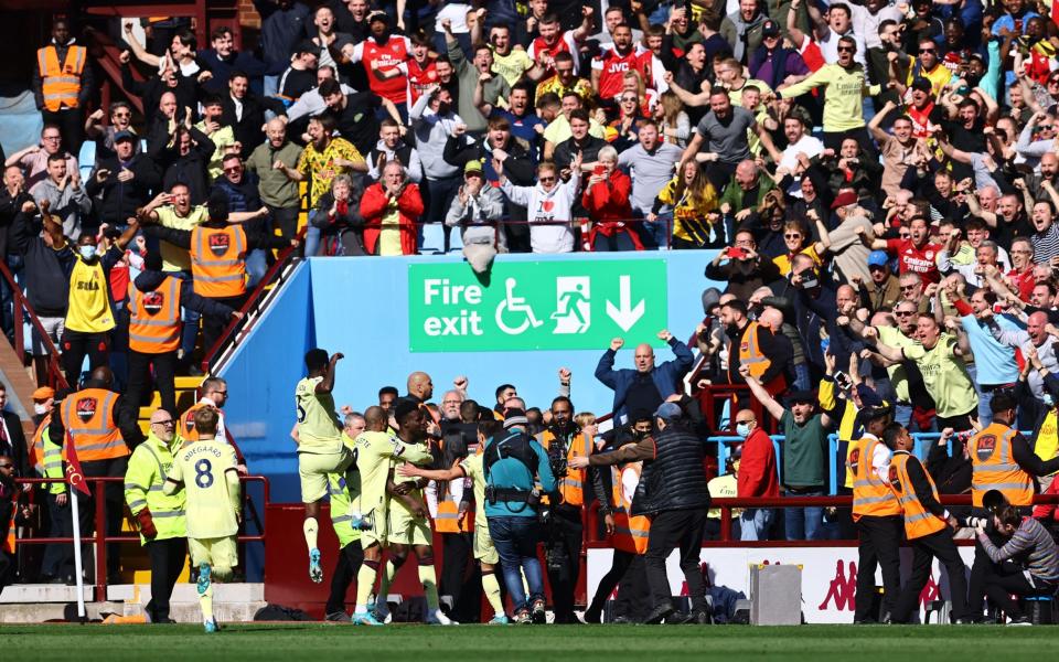 Arsenal celebrate Saka's goal - REUTERS