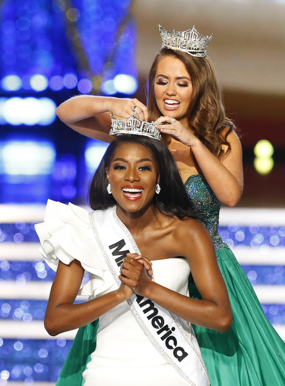 FILE - In this Sept. 9, 2018, file photo, Miss New York Nia Franklin reacts after being named Miss America 2019, as she is crowned by last year's winner Cara Mund, in Atlantic City, N.J. Franklin will participated in the Macy's Thanksgiving Day Parade in New York City on Nov. 23. (AP Photo/Noah K. Murray, File)