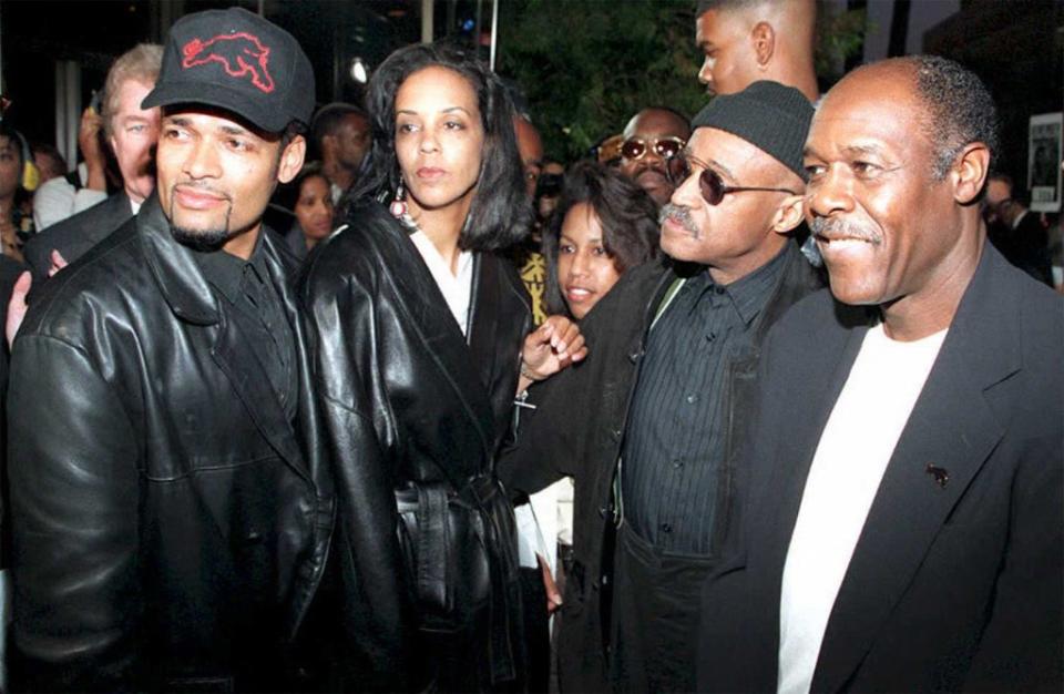 This file picture from 1995 shows Mario Van Peebles (left) with his father Melvin (second from the right) (AFP via Getty Images)