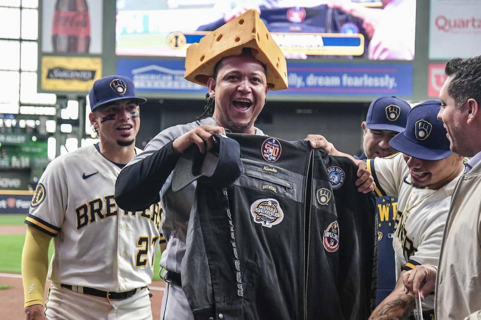 Detroit Tigers first baseman Miguel Cabrera (24) reacts after he was presented with a cheesehead by the Milwaukee Brewers during a presentation for Cabrera who said this will be his final season at American Family Field in Milwaukee on Wednesday, April 26, 2023.