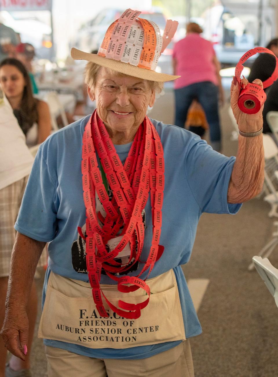 Delores Sciamacco sells raffle tickets.