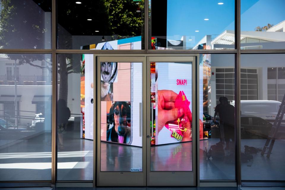 A cube installation from the outside of the gallery space