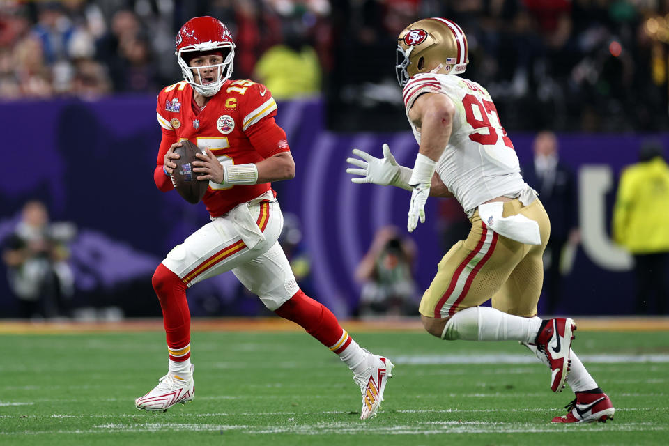 Patrick Mahomes of the Kansas City Chiefs is pressured by Nick Bosa of the San Francisco 49ers during Super Bowl LVIII. (Photo by Ezra Shaw/Getty Images)