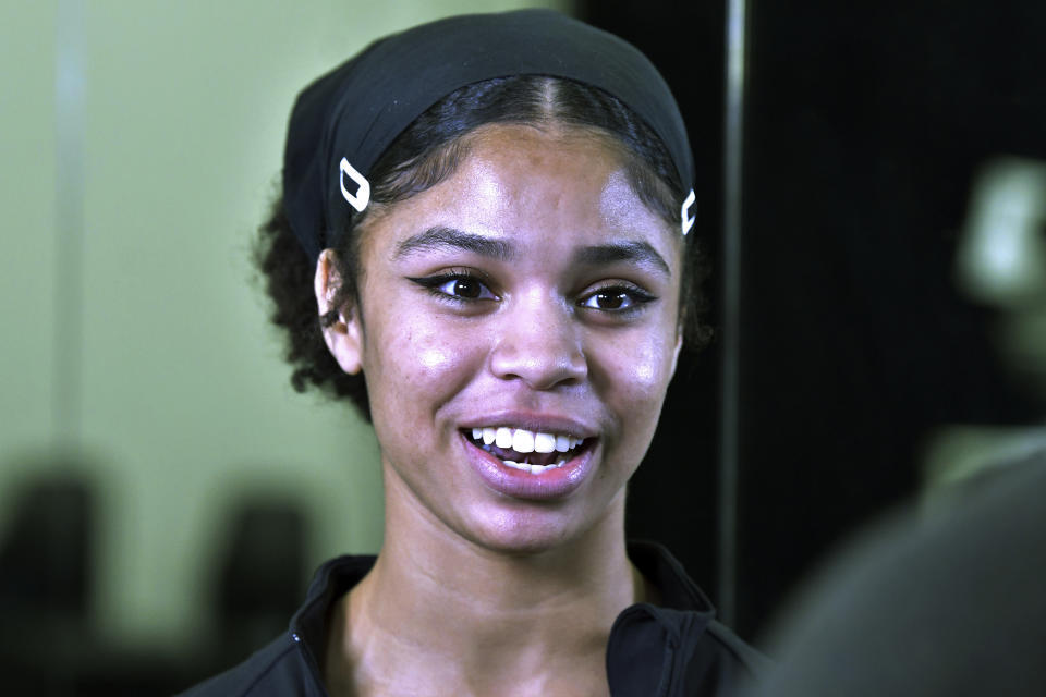 Boston Conservatory at Berklee student Rhapsody Stiggers, of St. Paul, Minn., speaks to a reporter before a Rockettes Precision Dance Technique course Wednesday, Feb. 8, 2023, at the Boston Conservatory at Berklee in Boston. (AP Photo/Josh Reynolds)