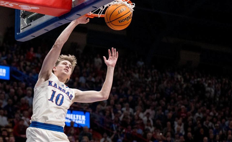 Kansas Jayhawks guard Johnny Furphy (10) dunks the ball against the BYU Cougars during an NCAA college basketball game on Tuesday, Feb. 27, 2024, in Lawrence. Nick Wagner/nwagner@kcstar.com