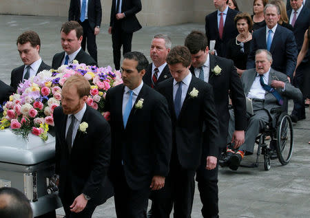 Former U.S. President George H.W. Bush attends the funeral service for his wife, former first lady Barbara Bush, with his son the 43rd U.S. President George W. Bush at St. Martin's Episcopal Church in Houston, Texas, U.S., April 21, 2018. REUTERS/Richard Carson