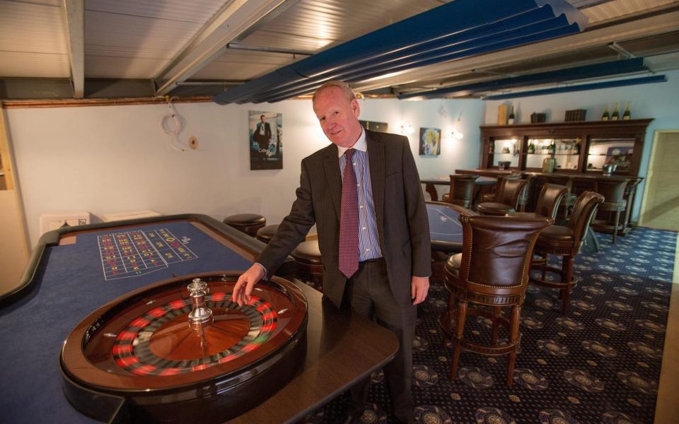 Graham Wildin inside the leisure centre he has built for himself and his family - Credit:  SWNS.com