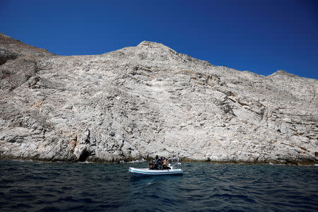 Members of the Fournoi Survey Project are seen on an inflatable boat before a dive at a shipwreck site on the island of Fournoi, Greece, September 19, 2018. Picture taken September 19, 2018. REUTERS/Alkis Konstantinidis