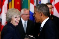 U.S. President Barack Obama (R) greets British Prime Minister Theresa May as he arrives for a luncheon during the United Nations General Assembly at United Nations headquarters in New York City, U.S. September 20, 2016. REUTERS/Lucas Jackson