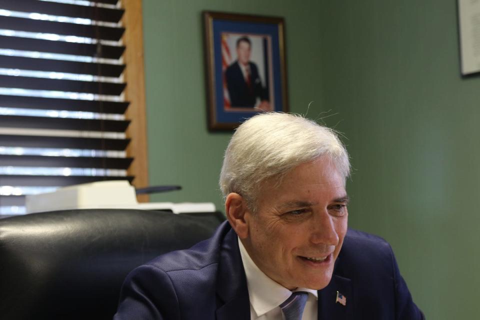 Nutley Commissioner and member of the Trump for President Advisory Board, Steven L. Rogers. Here he is in his office with a photo of Ronald Reagan behind him.