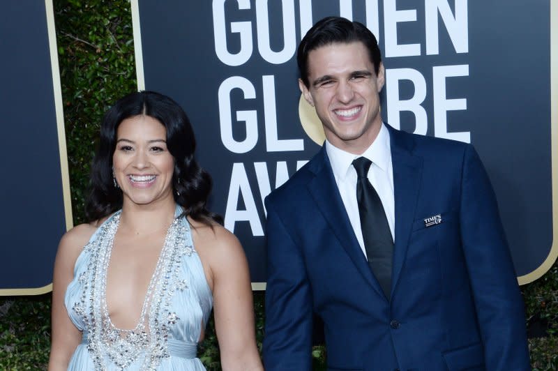 Gina Rodriguez (L) and Joe Locicero attend the Golden Globe Awards in 2019. File Photo by Jim Ruymen/UPI