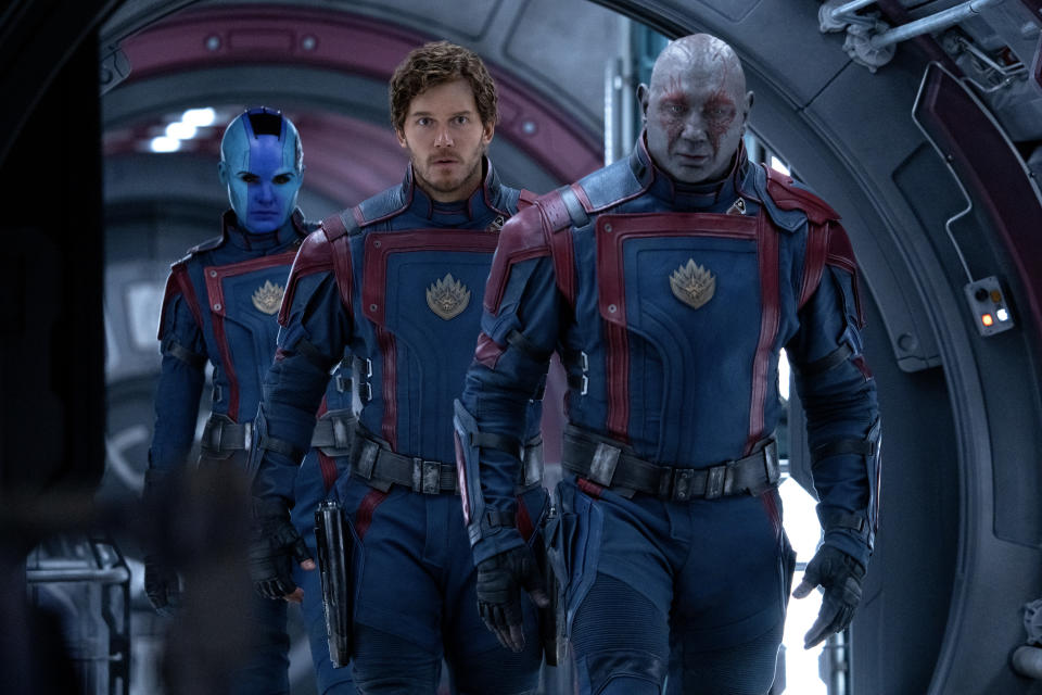 (L-R): Karen Gillan as Nebula, Chris Pratt as Peter Quill/Star-Lord, and Dave Bautista as Drax in Marvel Studios' Guardians of the Galaxy Vol. 3. Photo by Jessica Miglio. Â© 2023 MARVEL.