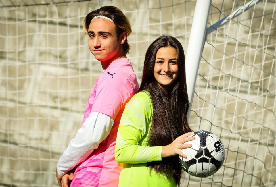 Anthony Patete, goalie for the East Bridgewater High boys soccer team poses for a photo with younger sister, Ava Patete, goalie for the Whitman-Hanson girls soccer team.