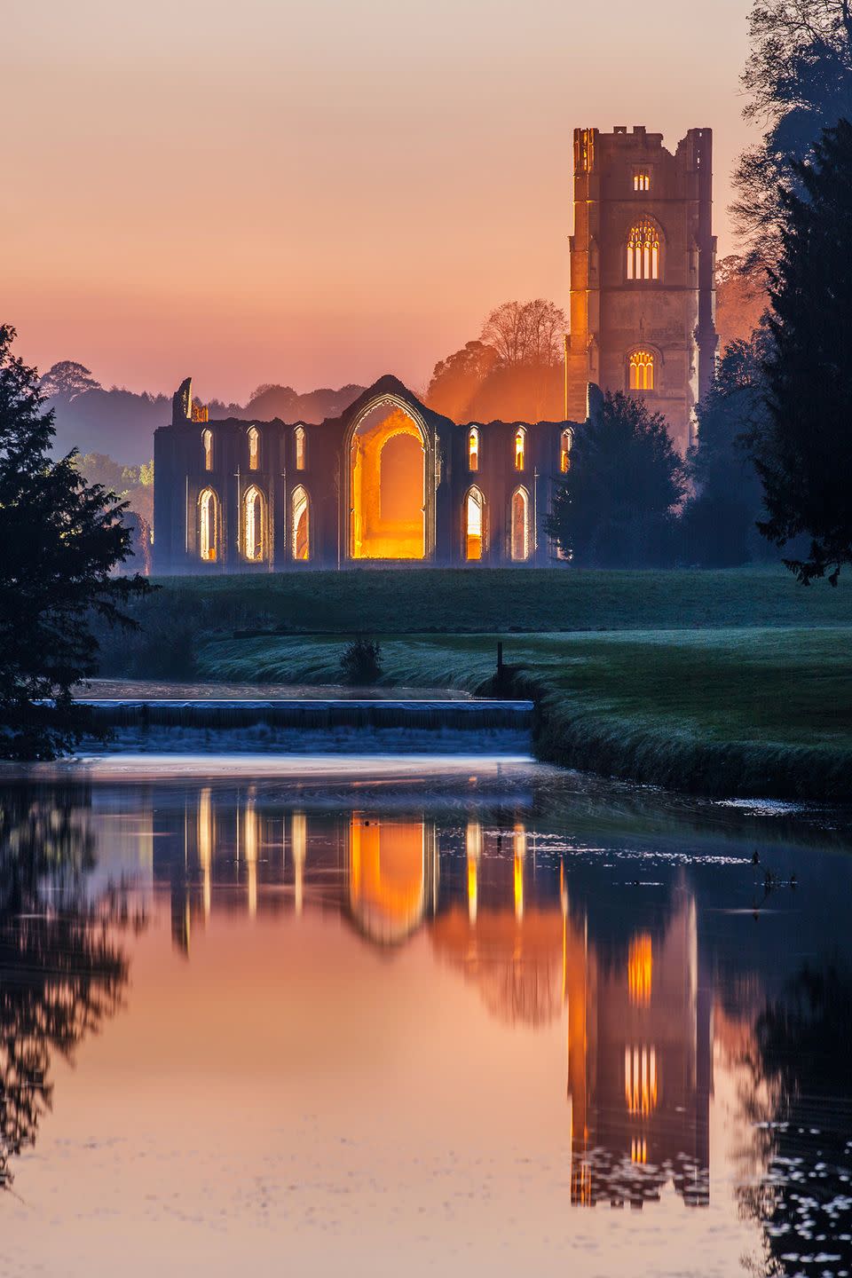 <p>Built by Benedictine monks in 1132, Fountains Abbey in Yorkshire grew from a small stone church to one of the most magnificent monasteries in the land. Now a UNESCO World Heritage Site, these riverside remains include Romanesque cloisters and the Chapel of Nine Alters – where a Green Man gargoyle glares at all who enter. To the west of the ruins, a lengthy cellarium features vast vaulted ceilings and passageways that stretch into the shadows. Under cover of darkness, bats (eight species are resident here) wing their way through the windows to flit about in search of food.</p><p><a class="link " href="https://go.redirectingat.com?id=127X1599956&url=https%3A%2F%2Fwww.nationaltrust.org.uk%2Ffountains-abbey-and-studley-royal-water-garden&sref=https%3A%2F%2Fwww.countryliving.com%2Fuk%2Ftravel-ideas%2Fstaycation-uk%2Fg34056936%2Fuk-halloween-locations%2F" rel="nofollow noopener" target="_blank" data-ylk="slk:MORE INFO;elm:context_link;itc:0;sec:content-canvas">MORE INFO</a></p>