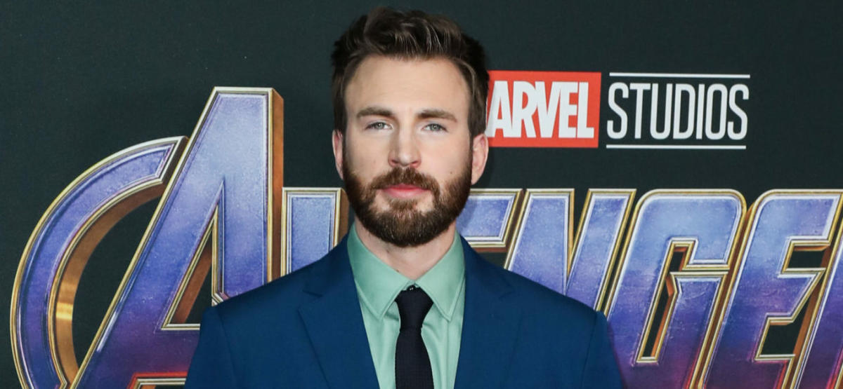 Chris Evans Flaunts Wedding Ring in First Public Confirmation of Marriage, Albany Herald Parade Partner Content