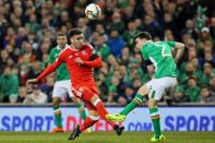 Wales's striker Hal Robson-Kanu vies with Republic of Ireland's defender Seamus Coleman (R) during the World Cup 2018 qualification football match March 24, 2017