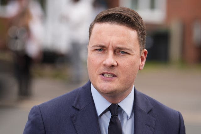 A close-up of Wes Streeting in a suit and tie