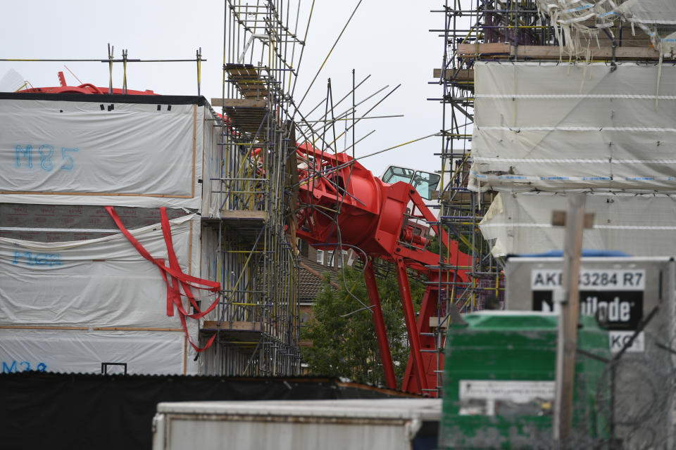 The scene in Bow, east London, where a 20-metre crane has collapsed on to a house leaving people trapped inside.