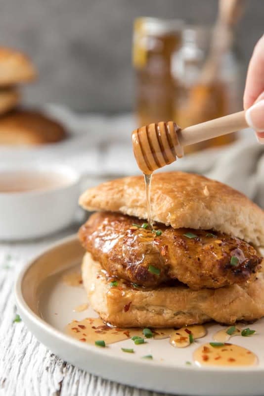 <p>The Crumby Kitchen</p><p>A much-appreciated upgrade of the popular drive-thru chicken and biscuit.</p><p><strong>Get the recipe: <a href="https://thecrumbykitchen.com/buttermilk-fried-chicken-biscuits-hot-honey/" rel="nofollow noopener" target="_blank" data-ylk="slk:Buttermilk Fried Chicken Biscuits With Hot Honey;elm:context_link;itc:0;sec:content-canvas" class="link rapid-noclick-resp">Buttermilk Fried Chicken Biscuits With Hot Honey</a></strong></p>