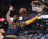 May 27, 2016; Toronto, Ontario, CAN; Cleveland Cavaliers forward LeBron James (23) scores a basket during the third quarter of game six of the Eastern conference finals of the NBA Playoffs against the Toronto Raptors at Air Canada Centre. Mandatory Credit: Nick Turchiaro-USA TODAY Sports