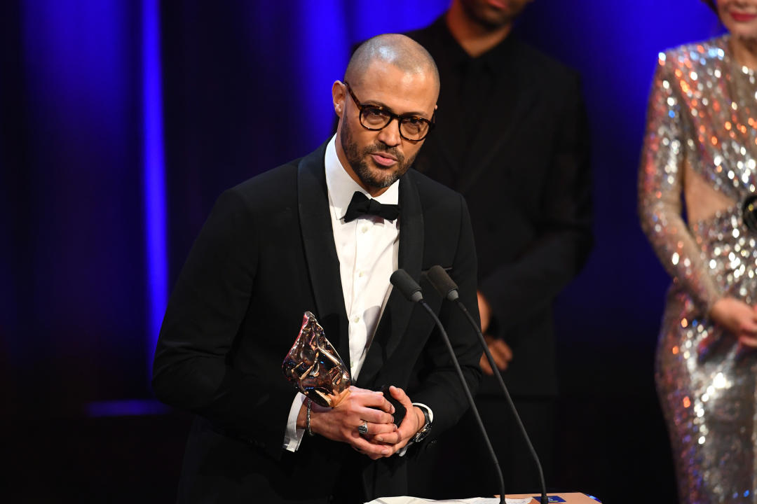 LONDON, ENGLAND - FEBRUARY 18: Cord Jefferson accepts the Adapted Screenplay Award for 'American Fiction' on stage during the EE BAFTA Film Awards 2024 at The Royal Festival Hall on February 18, 2024 in London, England. (Photo by Joe Maher/BAFTA/Getty Images for BAFTA)