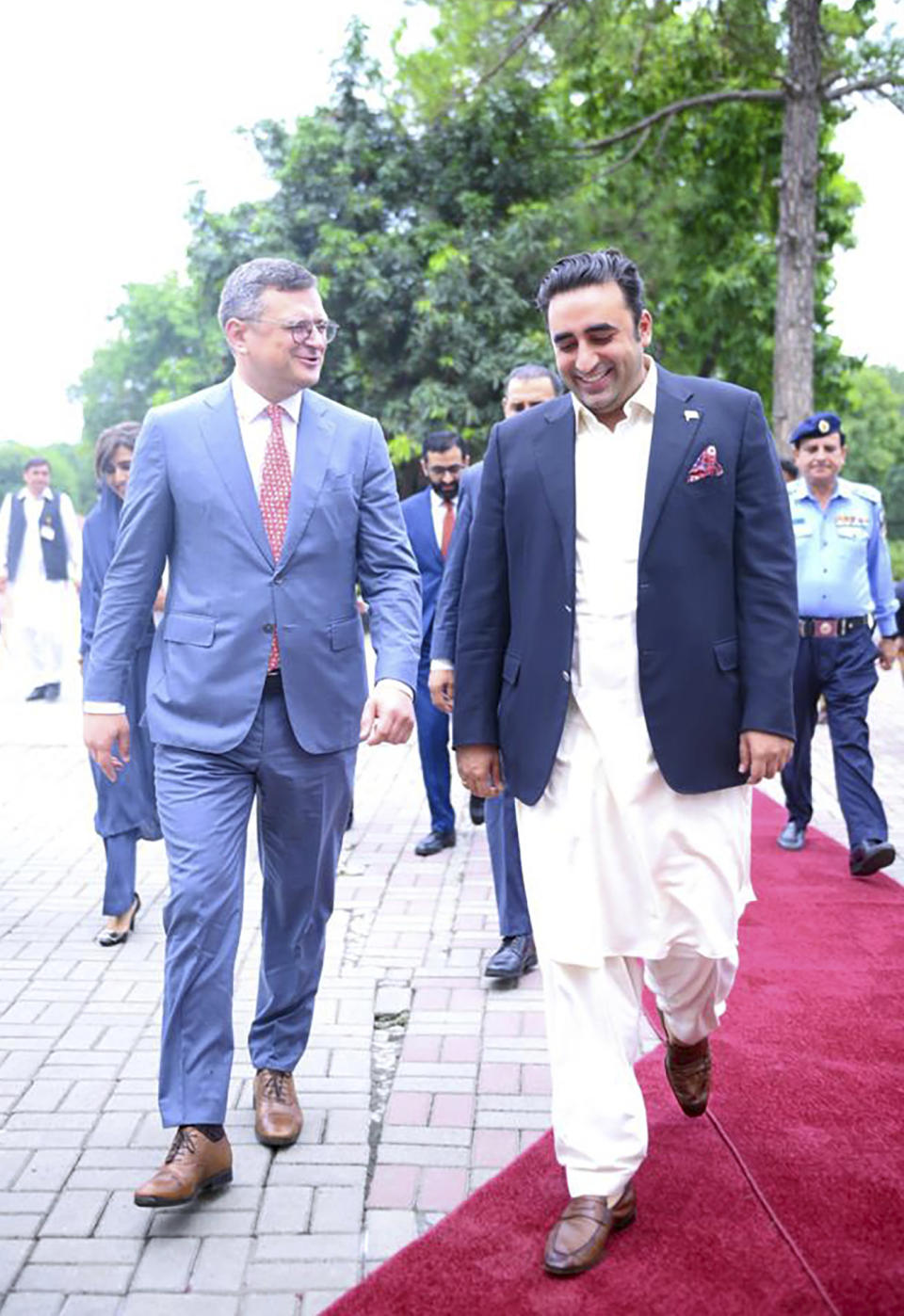 In this handout photo released by Pakistan Foreign Ministry Press Service, Pakistan's Foreign Minister Bilawal Bhutto Zardari, right, receives Ukraine's Foreign Minister Dmytro Kuleba, at the foreign ministry in Islamabad, Pakistan, Thursday, July 20, 2023. (Pakistan Foreign Ministry Press Service via AP)