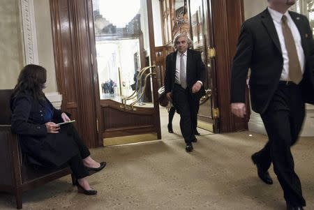 U.S. Secretary of Energy Ernest Moniz walks through halls after a meeting with Iranian officials at the Beau Rivage Palace Hotel March 26, 2015 in Lausanne, Switzerland. REUTERS/Brendan Smialowski/Pool