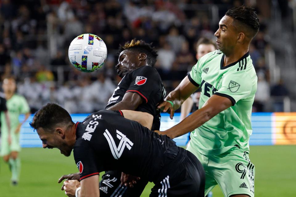 Austin FC forward Danny Hoesen battles D.C. United's Brendan Hikes-Ike during their 2022 match at Audi Field. Hikes-Ike joined Austin FC in February.