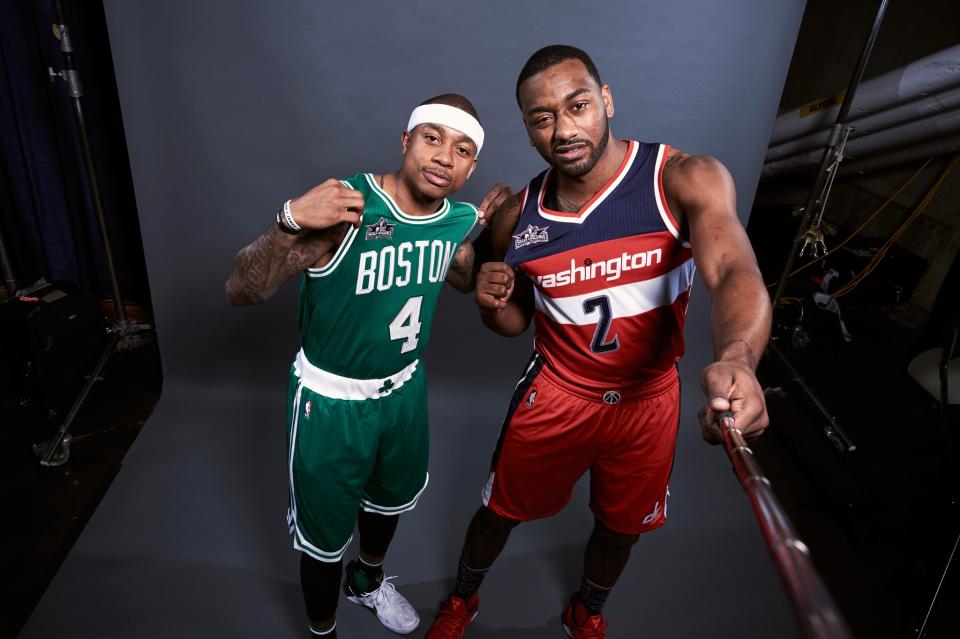 Eastern Conference All-Star point guards Isaiah Thomas and John Wall will try to knock one another out of the picture. (Getty Images)