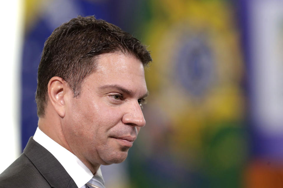 FILE - Alexandre Ramagem, the director of Brazil's intelligence agency ABIN, arrives for the ceremony presenting the National Vaccination Plan Against COVID-19 at Planalto presidential palace in Brasilia, Brazil, Dec. 16, 2020. Ramagem is among those targeted by search warrants police carried out the morning of Jan. 25, 2024 as part of a probe into alleged spying on political opponents under former President Jair Bolsonaro, according to an officer with knowledge of the operations. (AP Photo/Eraldo Peres, File)