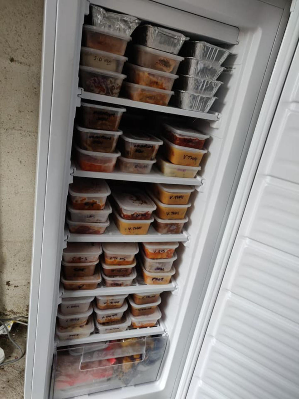 Mum's fridge filled with batch cooked meals