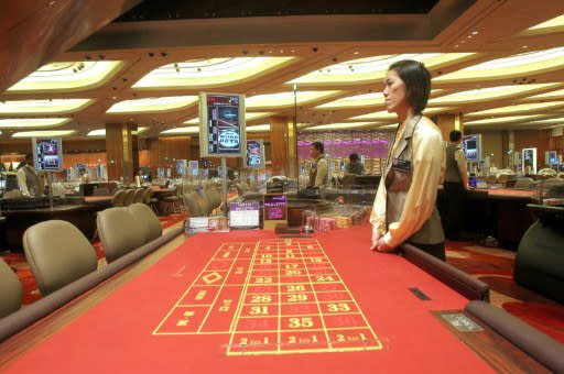 A masseur and his four accomplices offered "insurance bets" at Marina Bay Sands' casino. (AFP Photo)