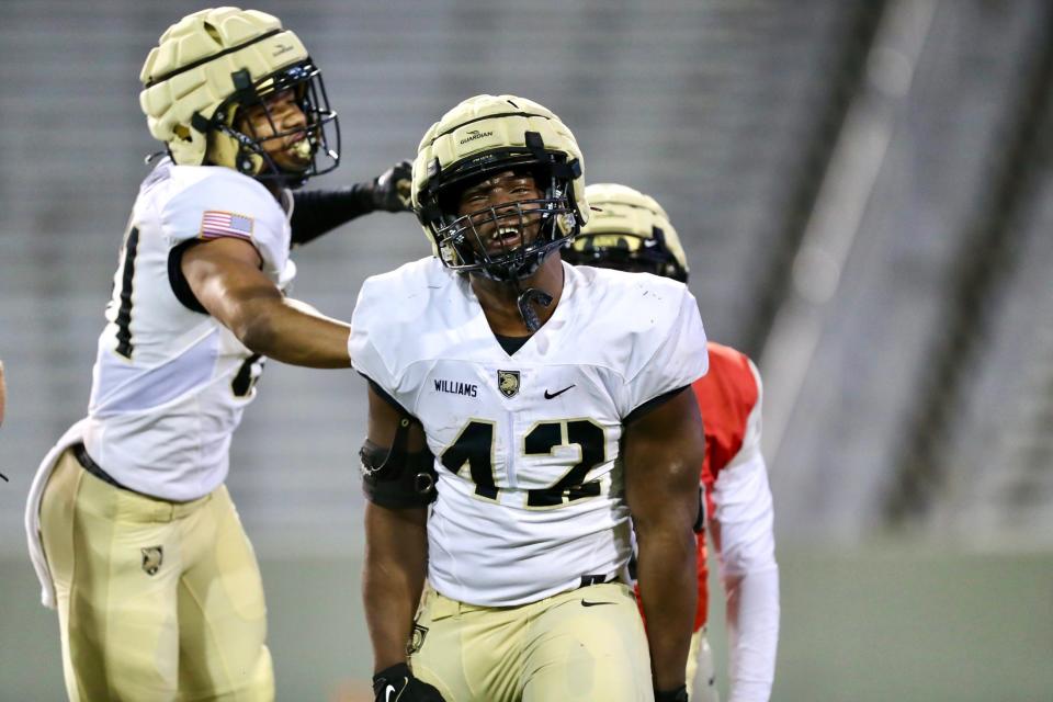 Army running back A.J. Williams (42), a rising senior, celebrates during the Black-and-Gold football scrimmage at West Point's Michie Stadium on April 12, 2024. DANNY WILD